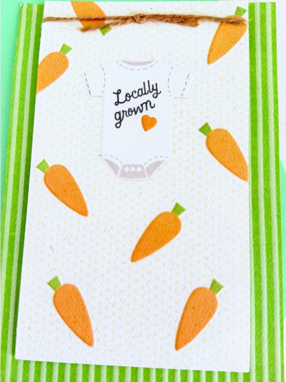 Baby shower card with 'Locally Grown' Onesie and Carrot Design